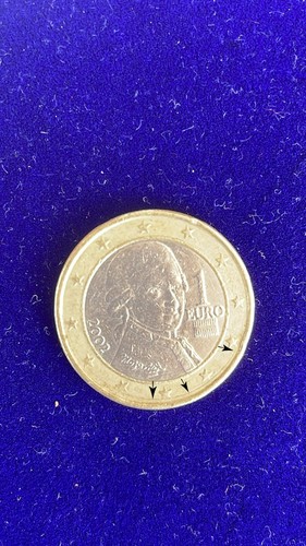 Euro coin with - 1, defect,